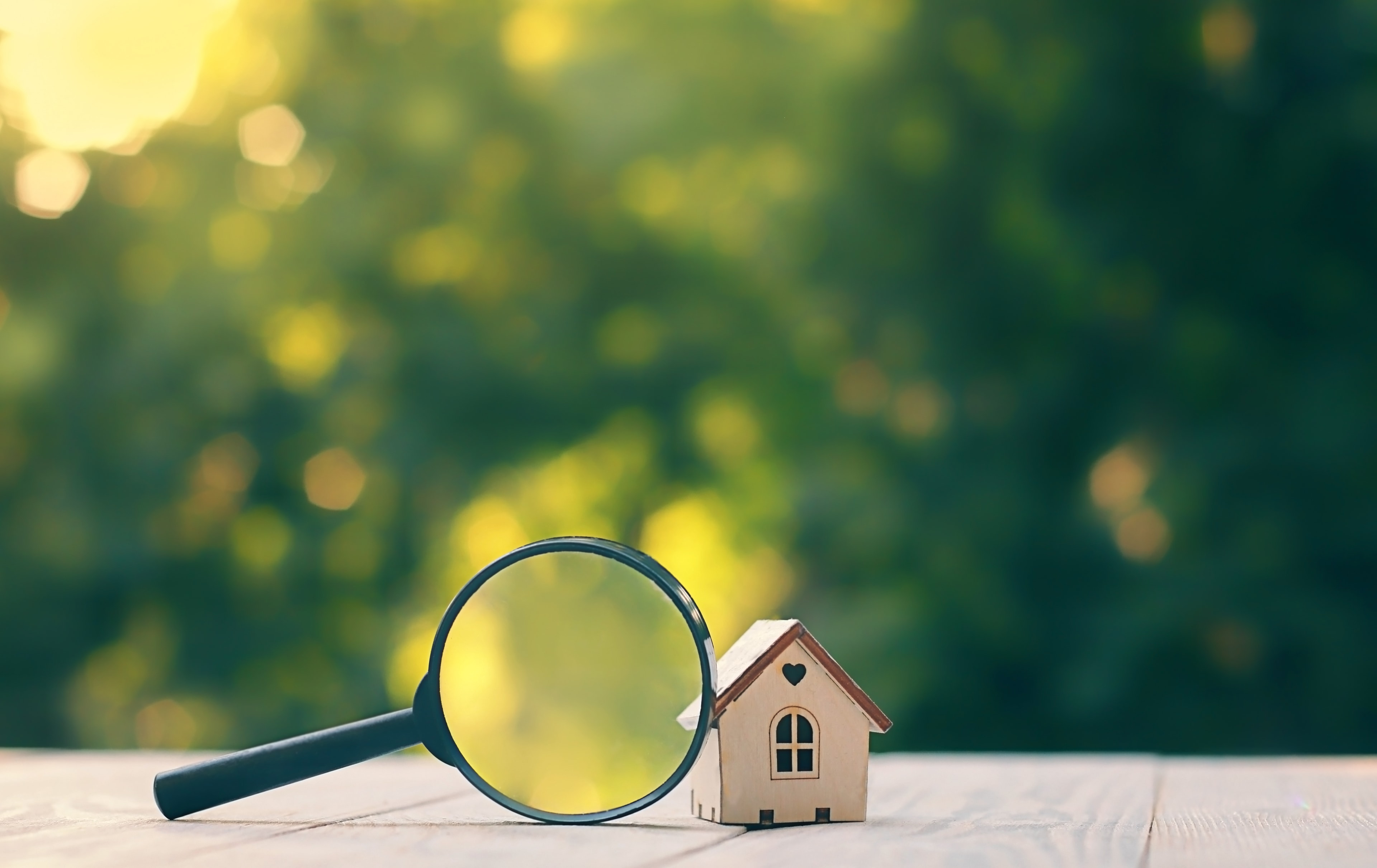 Mini,House,And,Magnifying,Glass,,Natural,Green,Background.,House,Searching,