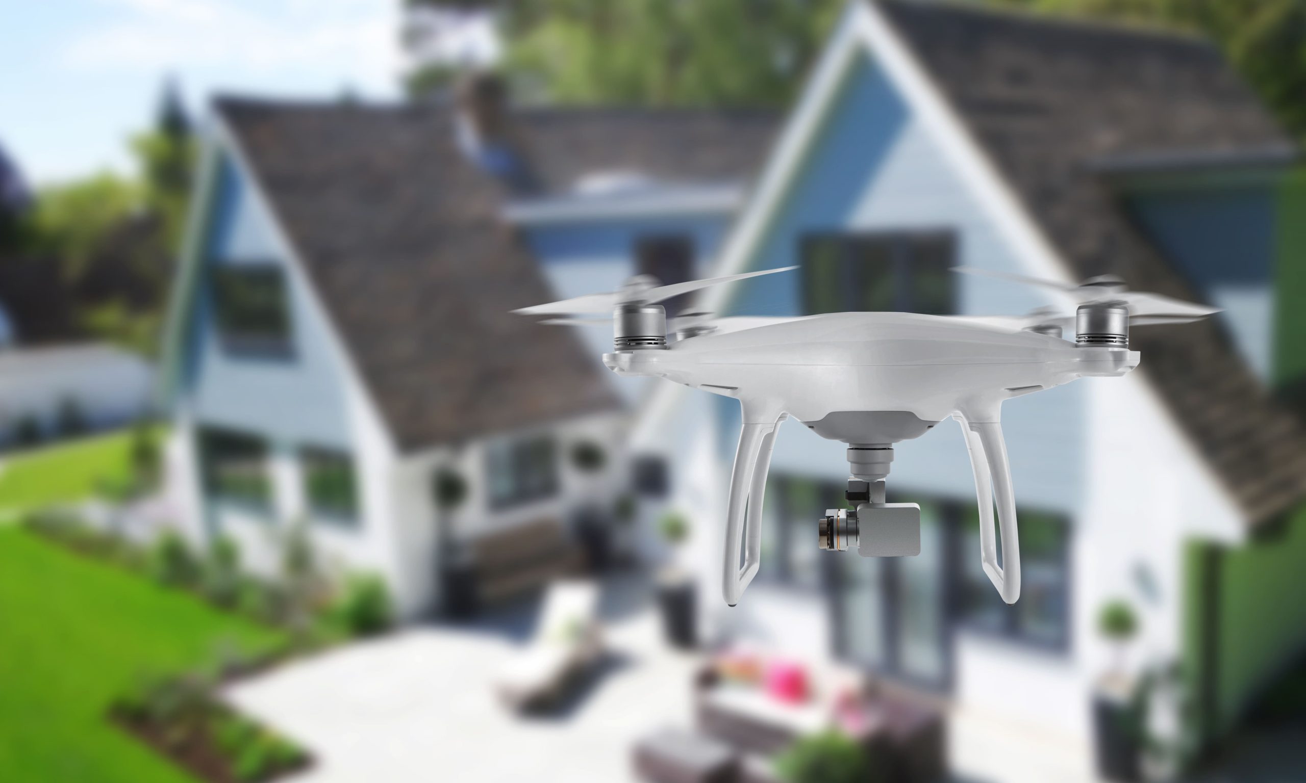 aerial photography drone with a house in the background